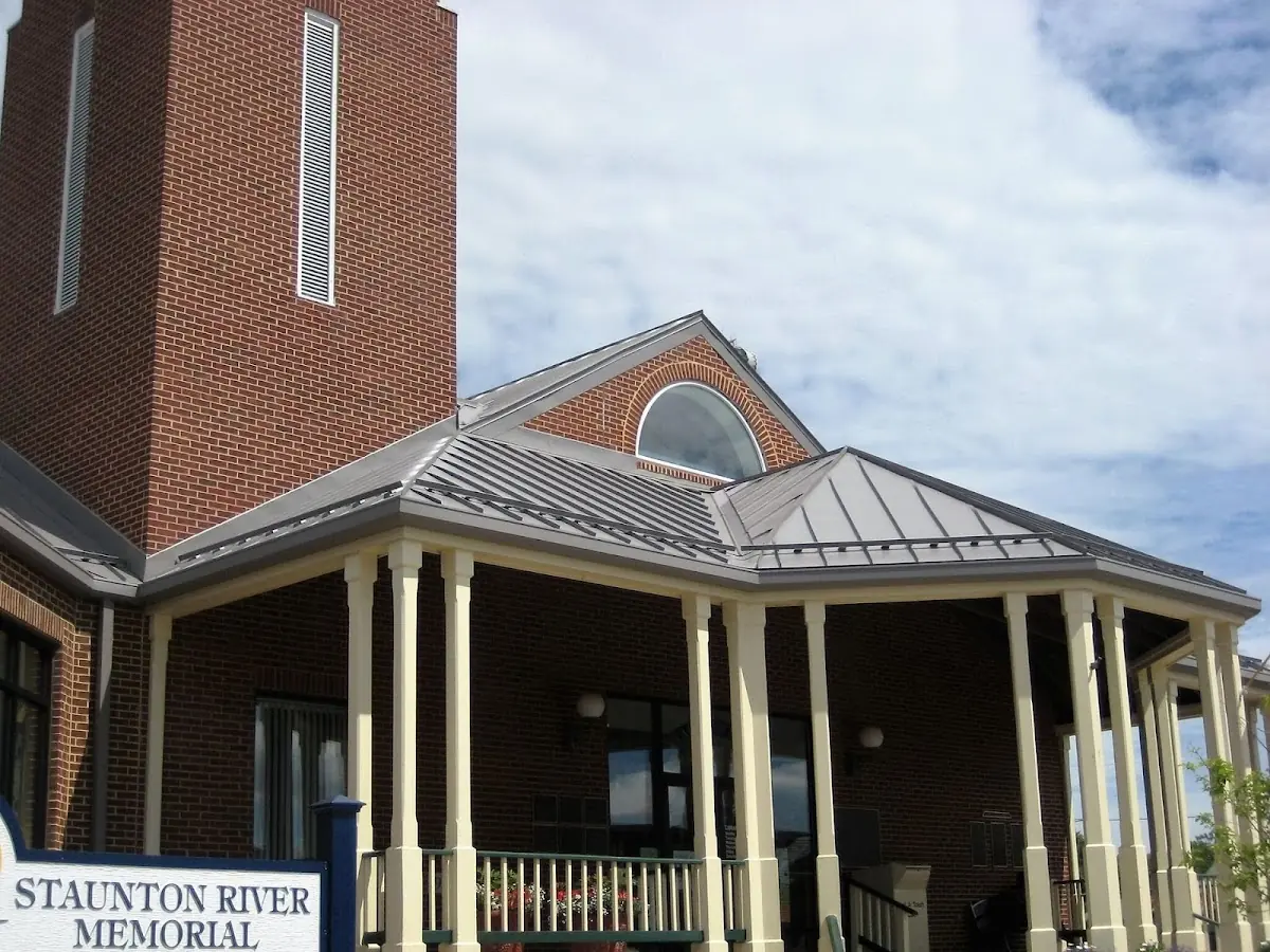 Skilled roofing craftsmen working on a residential roof in Upper Dutchtown